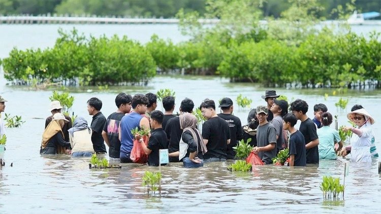 Religious sisters stand with flood-affected coastal communities in Indonesia